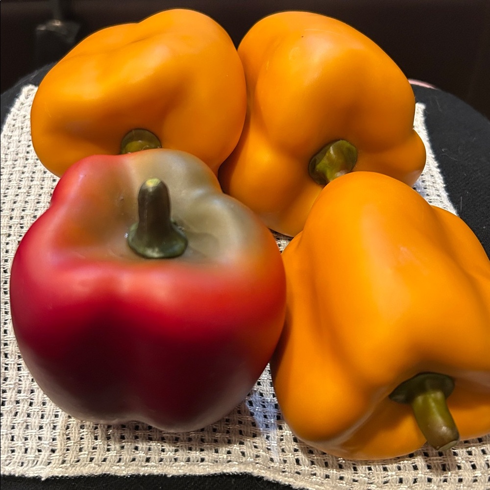 Faux bell peppers, 3 orange, one red